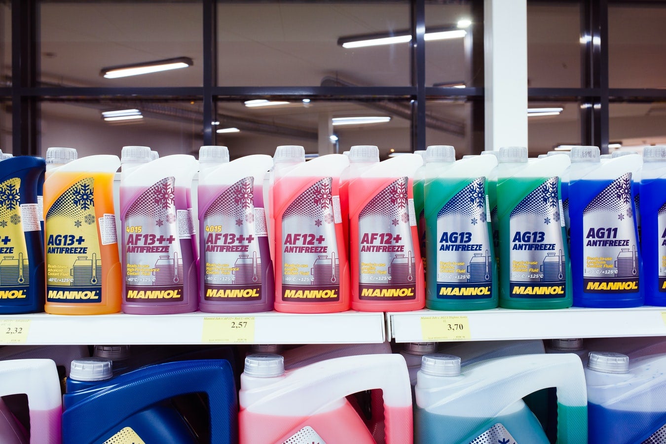 Row of Automotive Antifreeze Products in a Variety of Colors