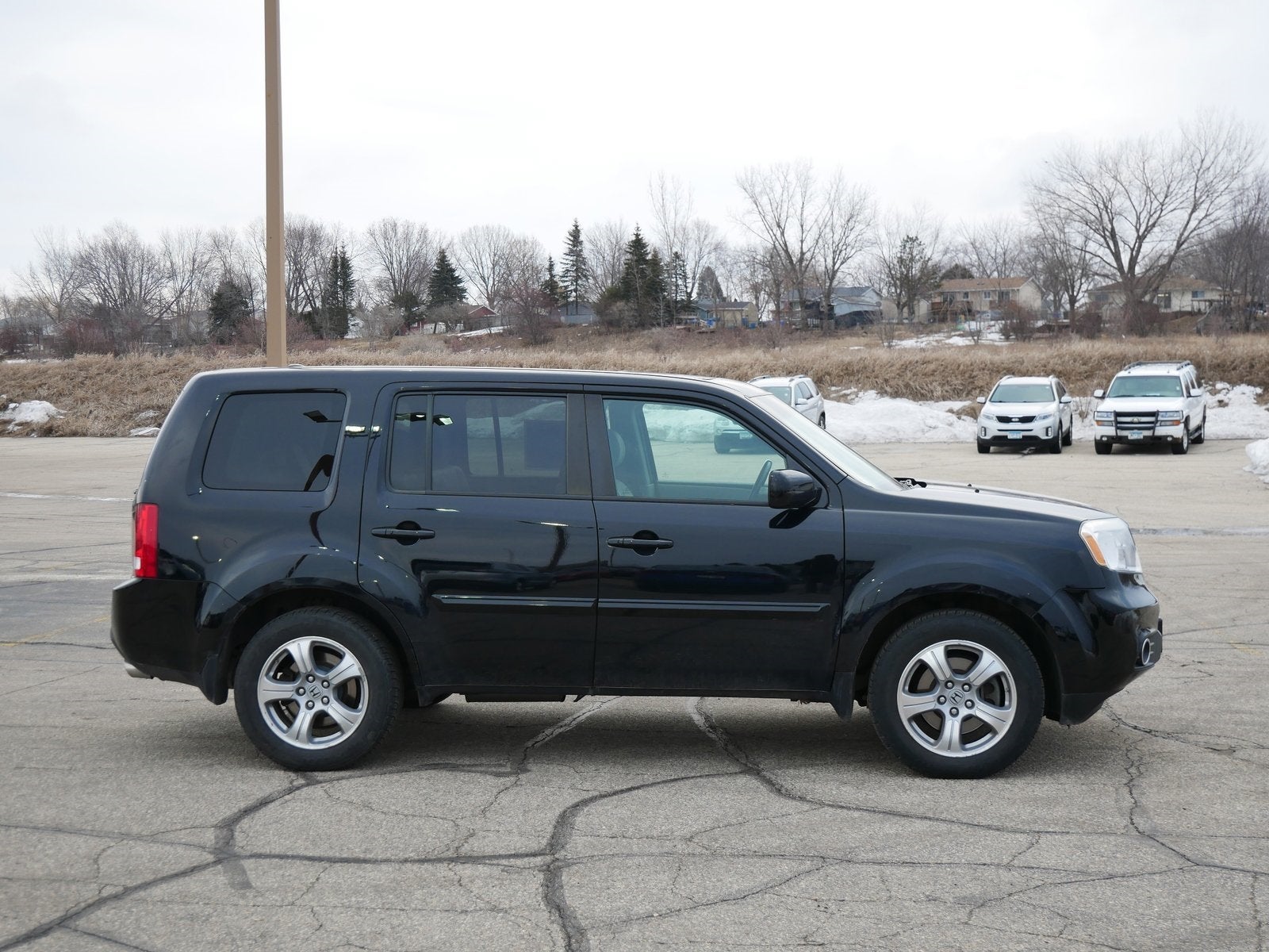 Used 2013 Honda Pilot EX-L with VIN 5FNYF4H50DB044712 for sale in Rochester, Minnesota